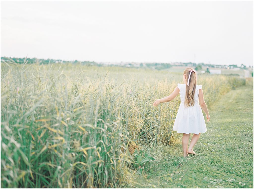 Girl walking by the field