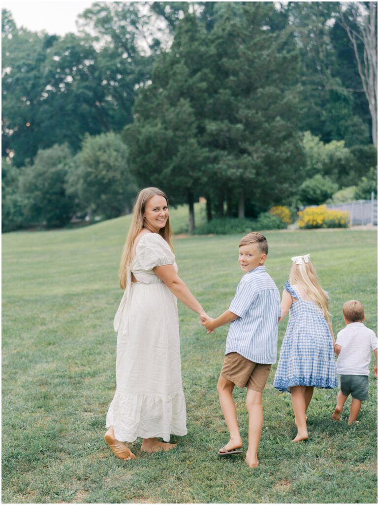 Homestead family session in Lancaster County PA with parents and kids in garden