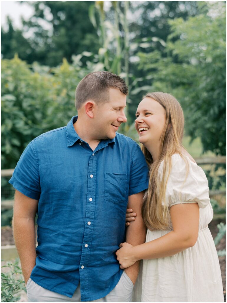Parents in a homestead garden during Lancaster County family session.