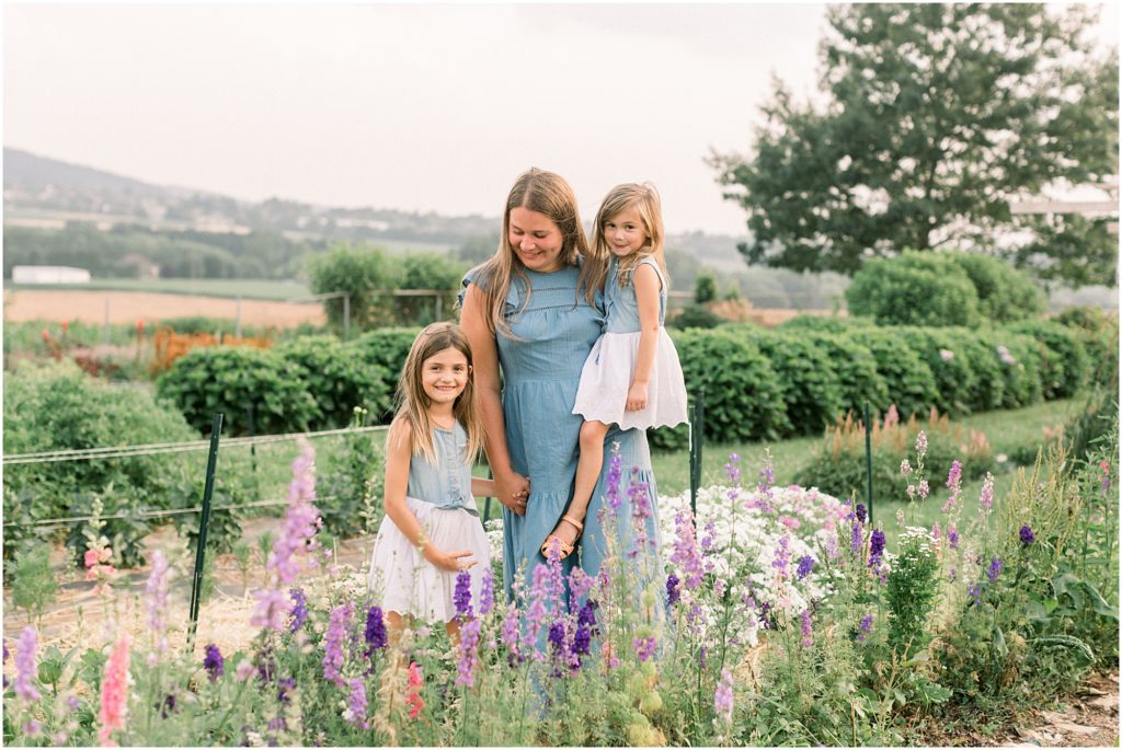 Momma and daughters at a flower farm