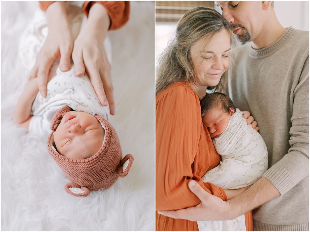 Momma's hands on newborn baby and parents snuggling baby