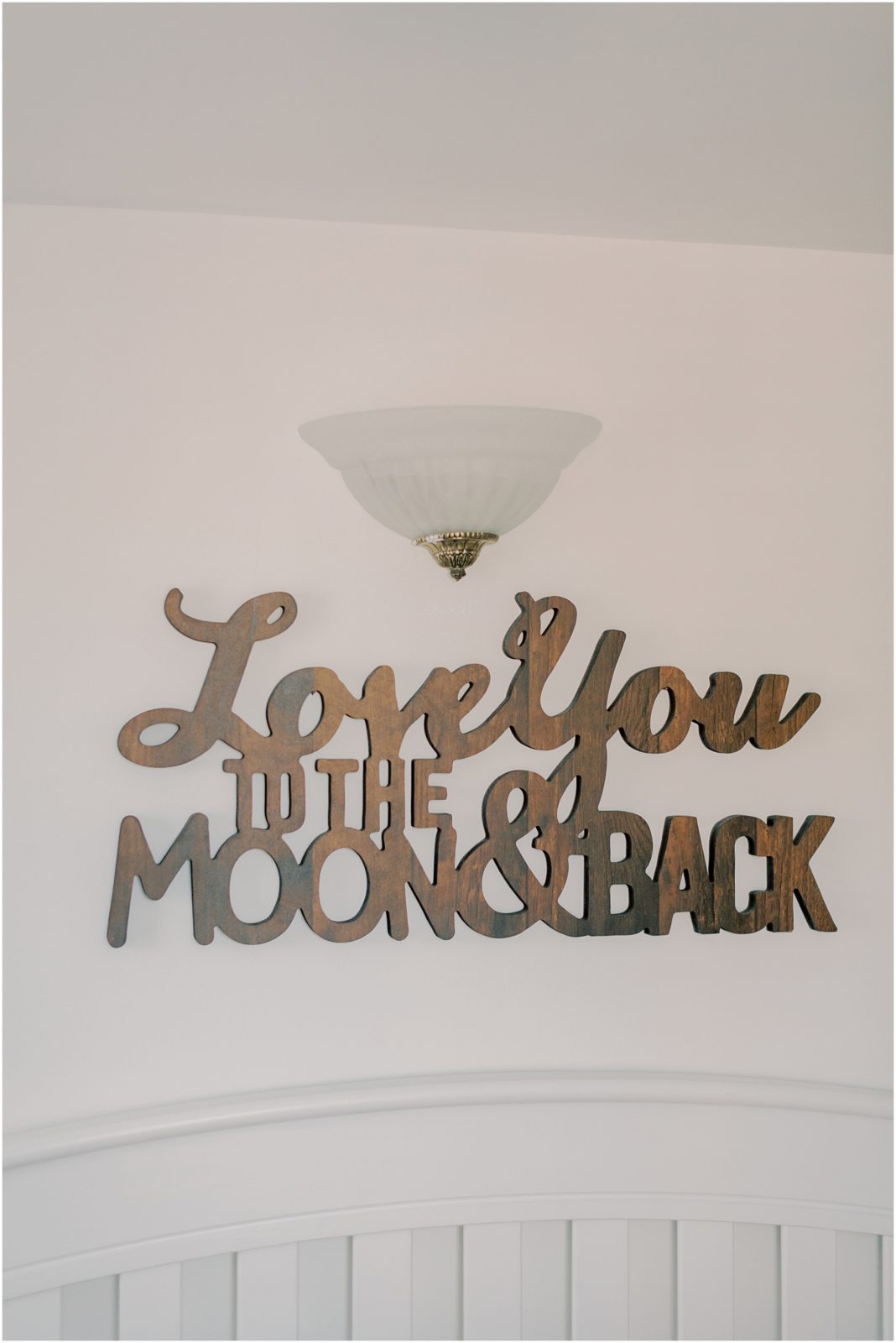 Love you to the moon and back sign in nursery
