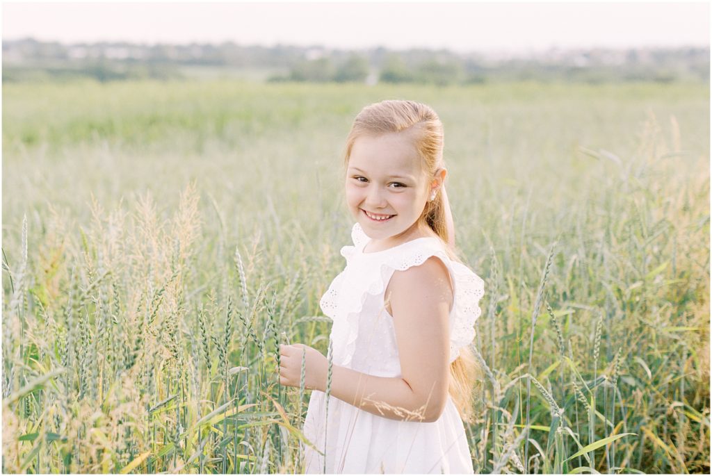 child in wheat field