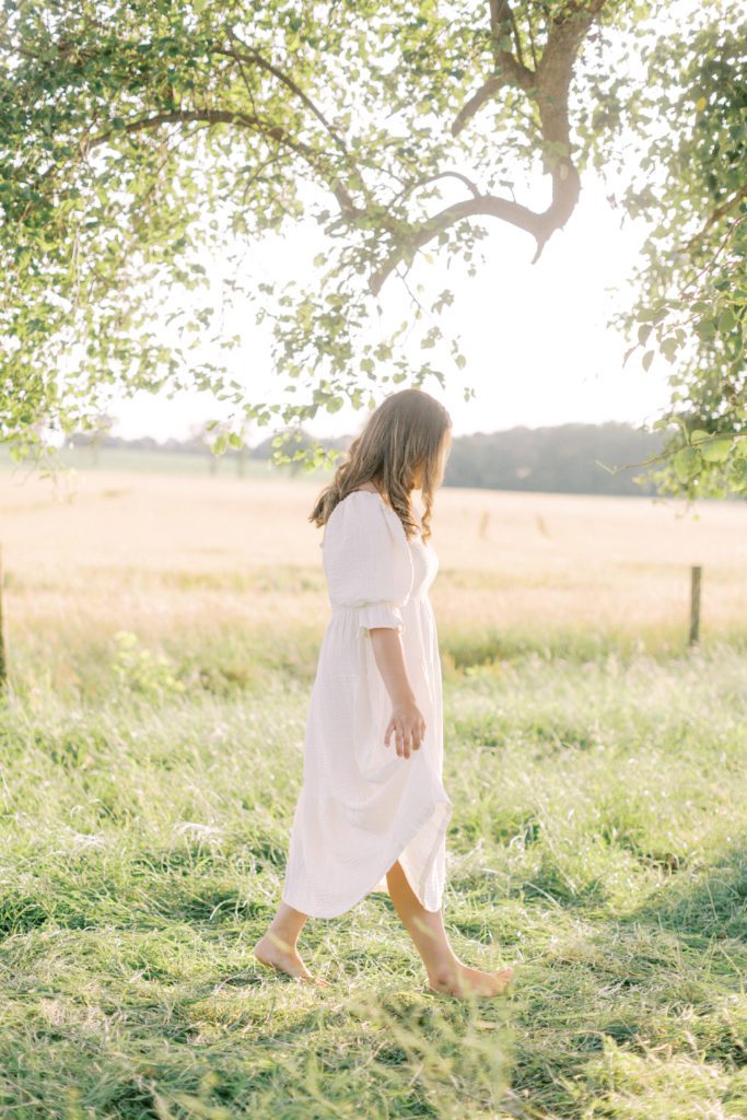 Woman walking through a field in three things I wish my clients knew