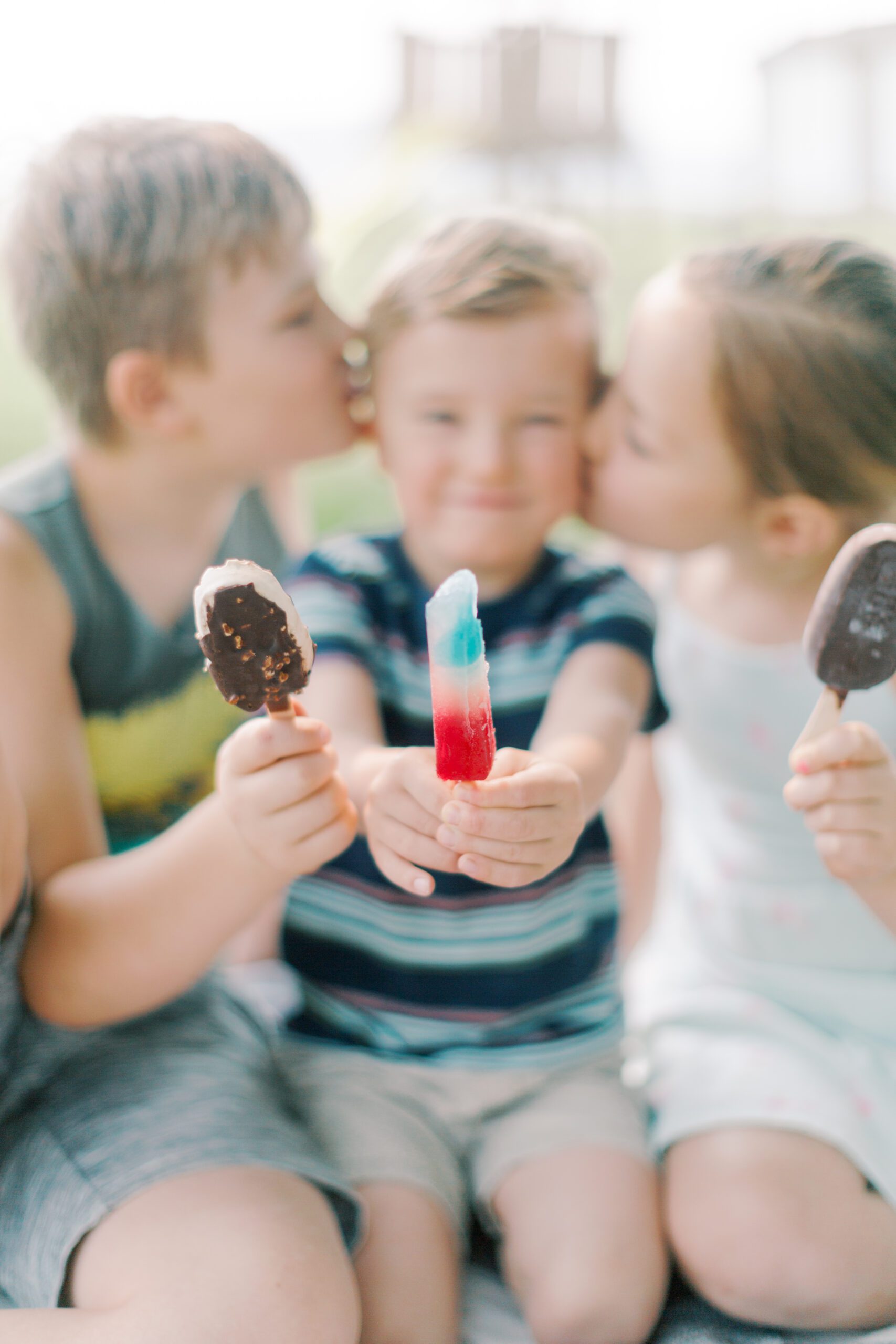 Kids with popsicles and ice cream in Summer Bucket List 2023