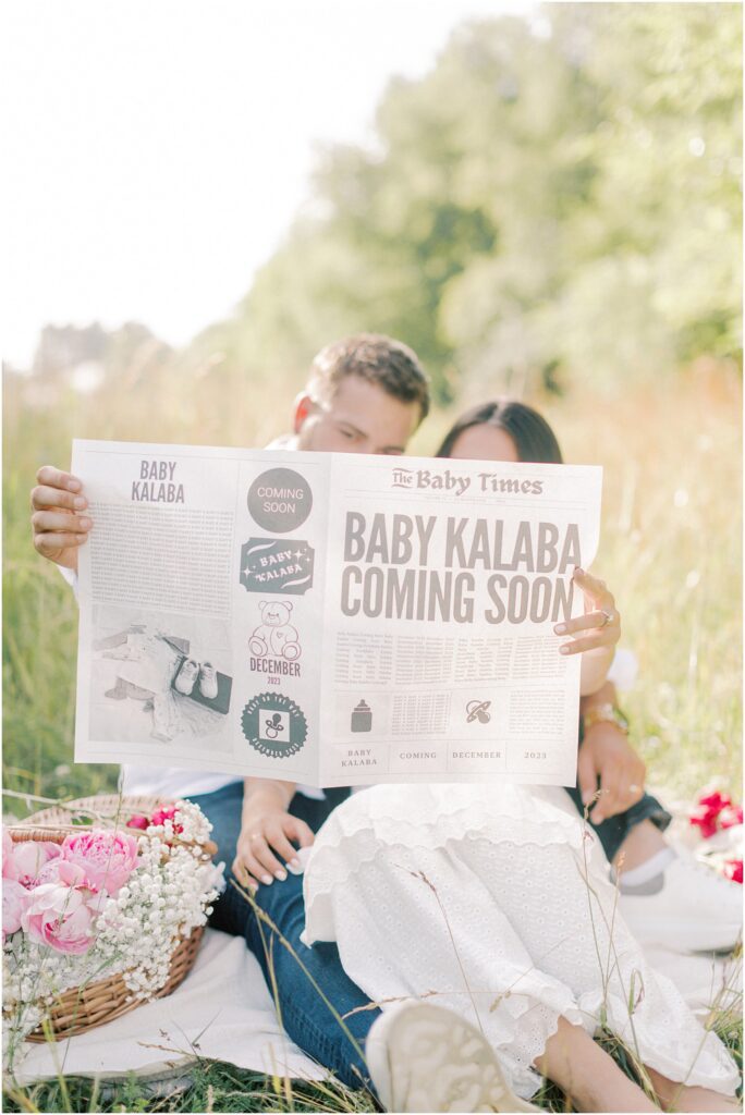 Maternity announcement with newspaper at an Intimate Maternity Session with Angelique Jasmin Photography