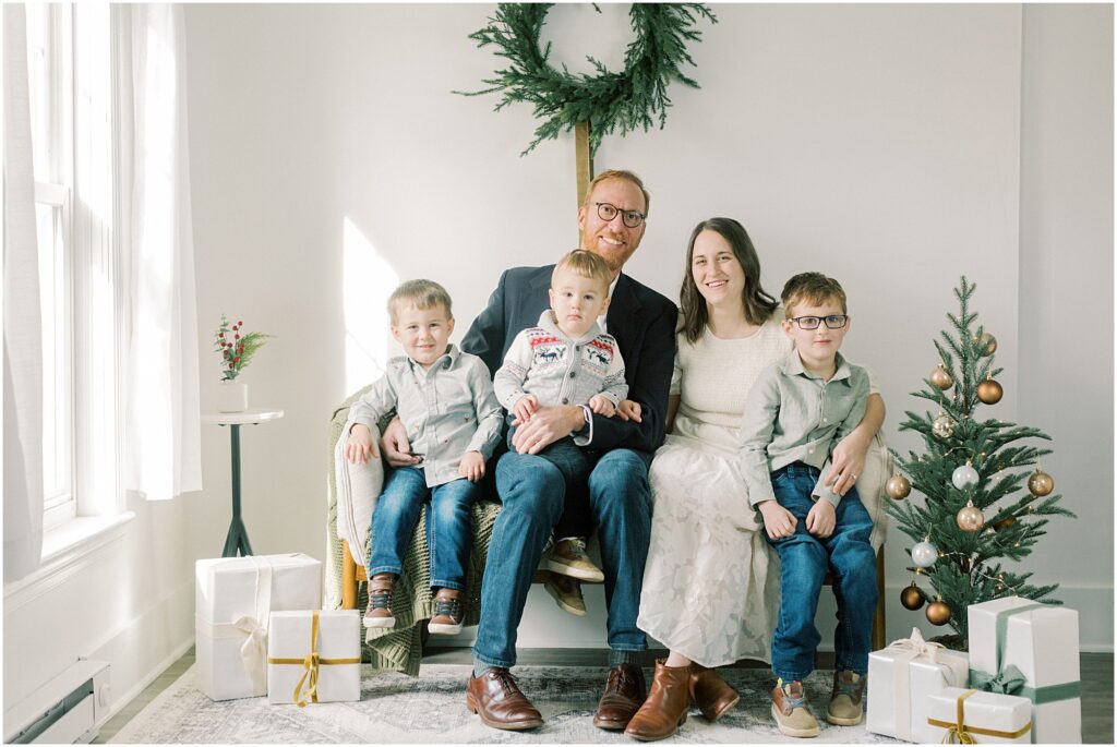 A family sitting together at Lancaster, PA Christmas Mini Sessions