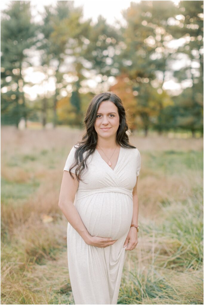 Pregnant woman in a field at Lancaster County Park Maternity Session