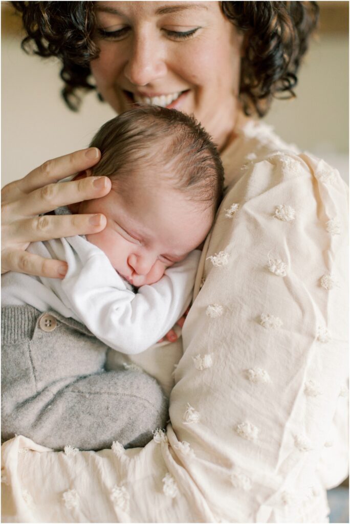 Newborn baby boy with mother captured by Angelique Jasmin Photography